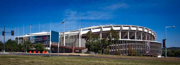 white concrete building on green grass field during daytime